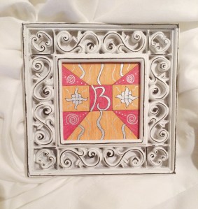 The "B" framed against a white backdrop. I picked this frame up at Hobby Lobby, I love that their frames are perpetually 50% off.